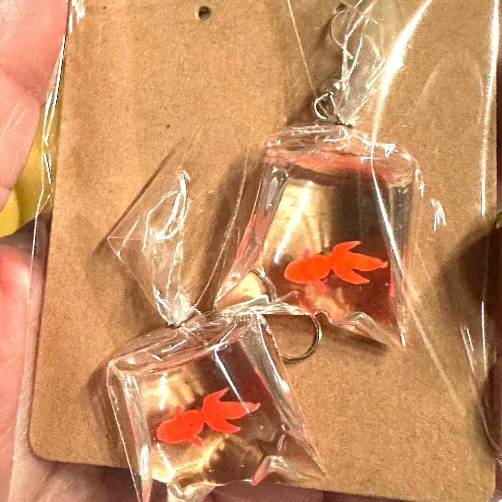 So cute dangling goldfish in a bag -‎
